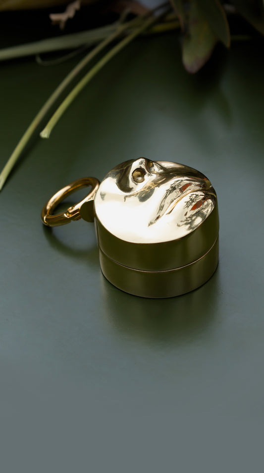 FACE PILLBOX KEYCHAIN
